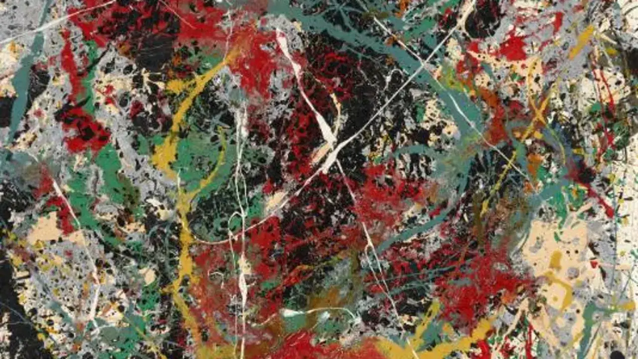 Dynamiczne Jackson Pollock dzieła: eksplozja kolorów, czerni i bieli tworzą chaotyczną, ale hipnotyzującą kompozycję.
